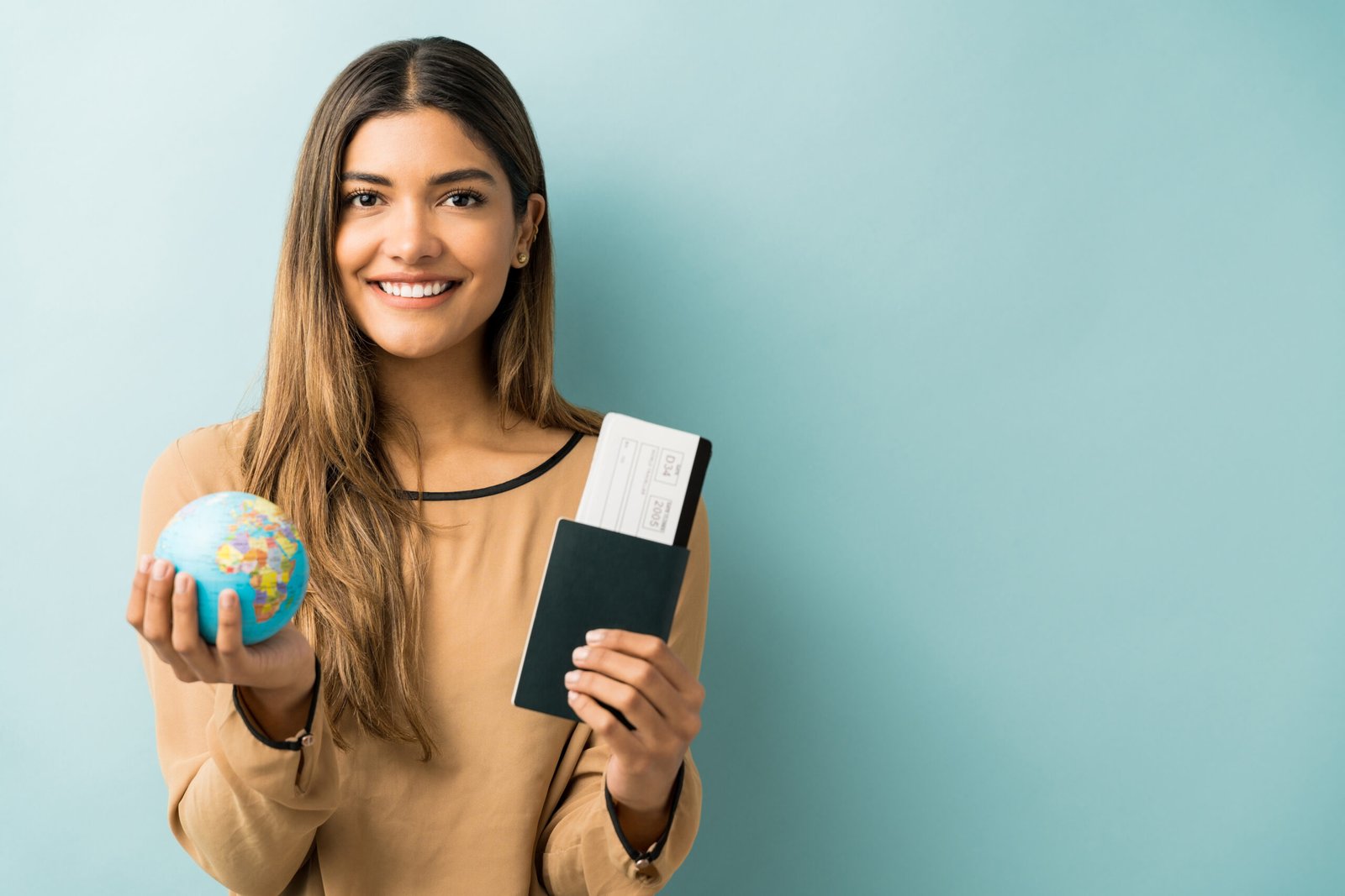 smiling woman happy for world tour in studio